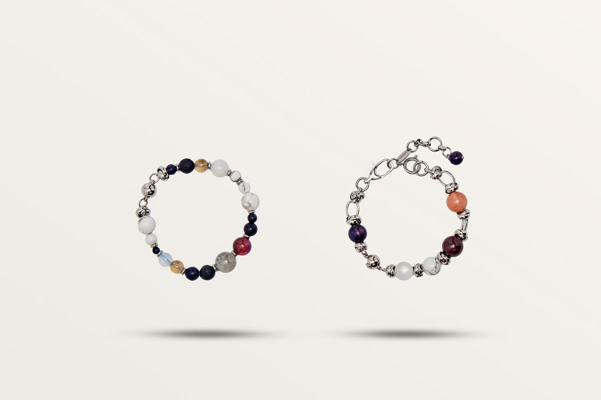 The Empower and Protect split into its two bracelets, mixed dark and pale stones with steel spacers
