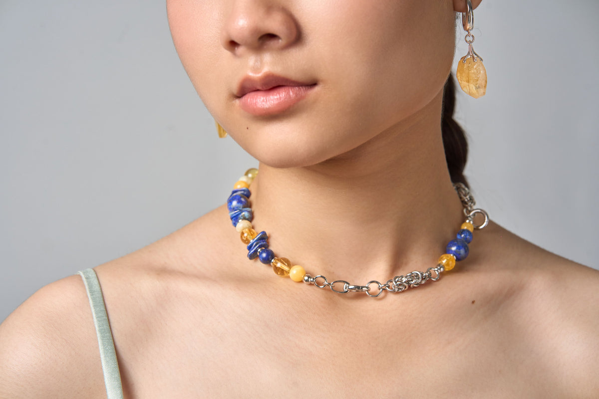 The Moon Phase worn as a necklace at the neck