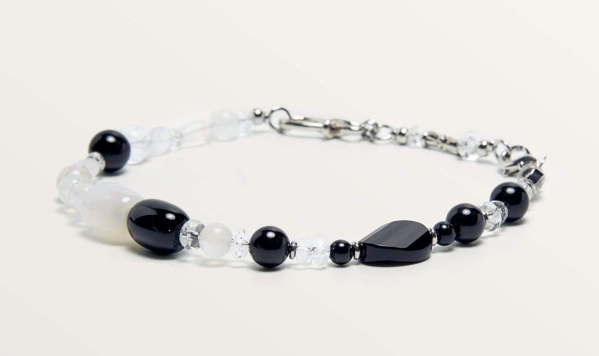 The Yin Yang, black and white stones laid out