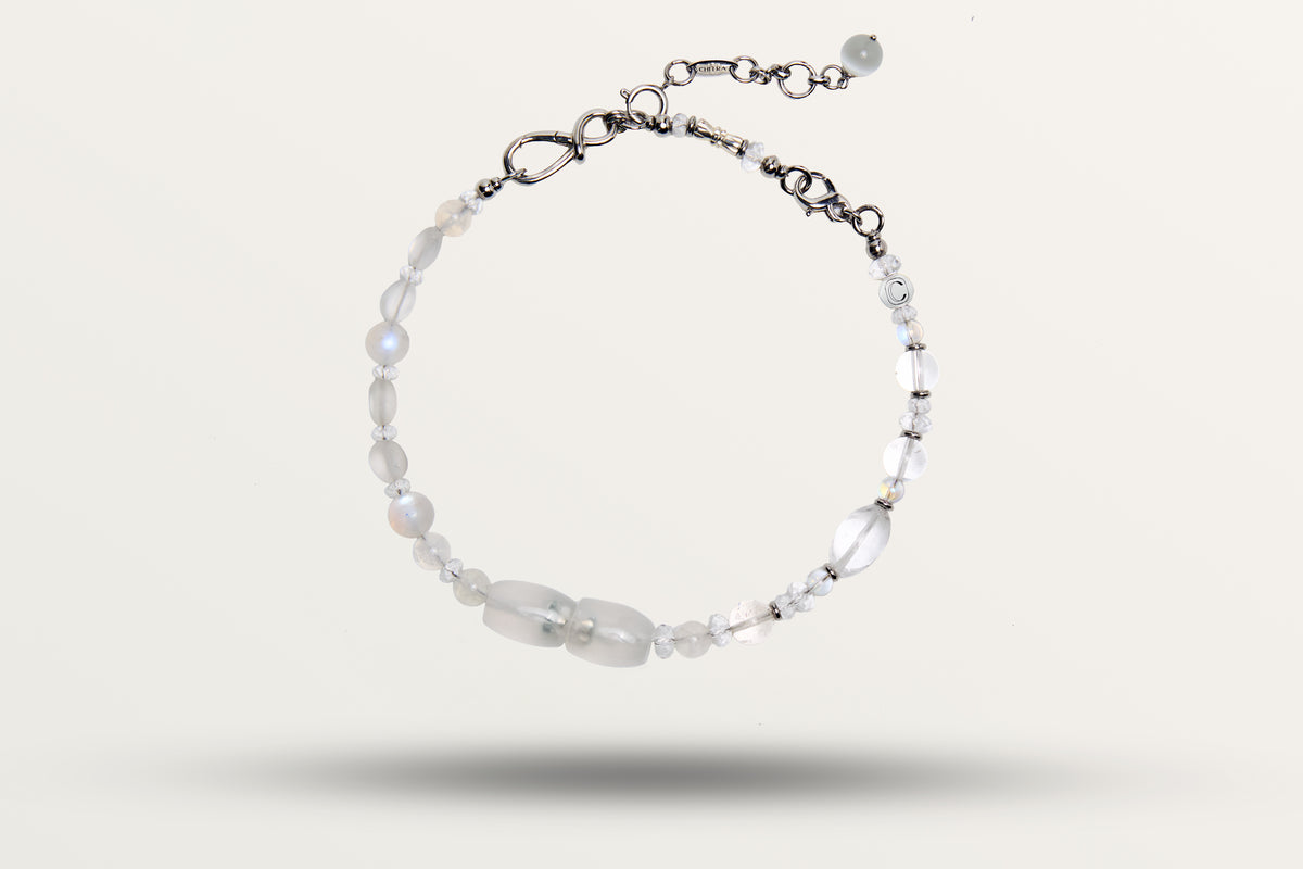 The Queen of Winter as a necklace, one closed loop of frosted and clear white stones